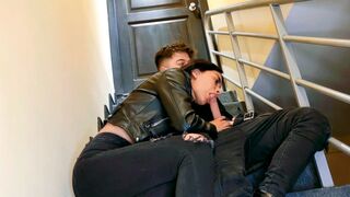 A couple has sex on the stairs of their apartment