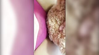 A girl is humping a teddy bear and gets horny as fuck