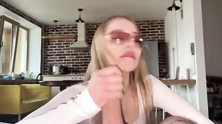 Pretty woman fucks with a guy and gets cum on her glasses