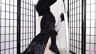 An oily and slutty 2B android is being examined in this hot video