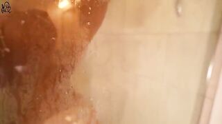 A young girl has sex with a big dildo in the shower
