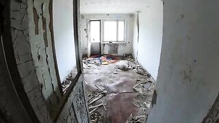 Girl is walking around horrible buildings, cock getting sucked in an abandoned house