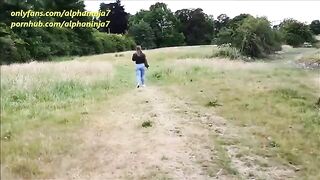 A hot girl is fucking outside in the park and gets cum on her face