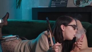 A girl with glasses gets her big dick sucked while smoking and getting her pussy eaten