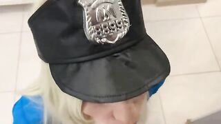 A sexy girl is dressed as a police officer, checking apartments
