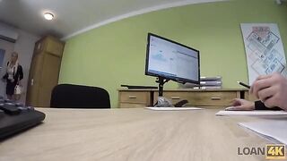 A business lady gets a loan from the bank for money
