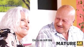 A mature woman is getting fucked in front of her husband by a waiter