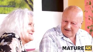 A mature woman is getting fucked in front of her husband by a waiter