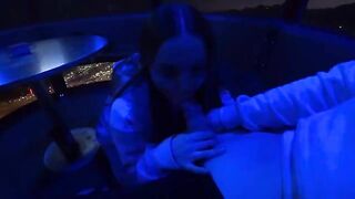 A couple has a romantic date in the park, getting intimate under the stars