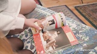 Lesbians study Kama Sutra before engaging in passionate play