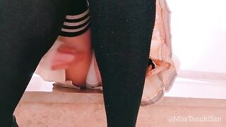 A Japanese schoolgirl removes her panties and indulges in solo pleasure