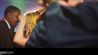Avery is having fun with a guy at the party