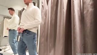 A couple has a good time shopping and almost gets caught in the fitting room