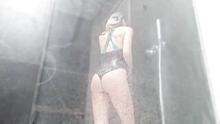 Sweet wet pussy makes a girl squirt in the shower