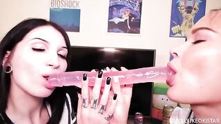 Two girls are having their fun with a double dildo