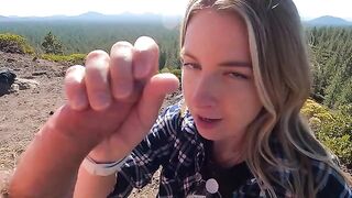 Blonde woman makes blowjob on the mountain top risking to be noticed