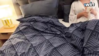 A hot stepmom and her stepson share a bed on a rainy night