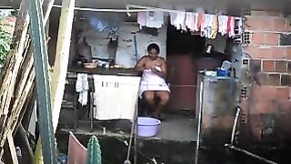 A girl does not know that there is a camera in her room