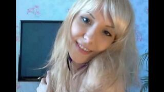 Blondie plays with her pussy using her fingers in a steamy session