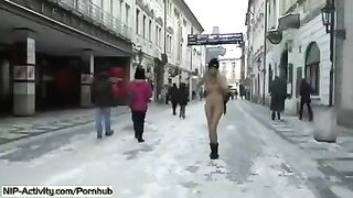 Blonde student with natural boobs flashes on the city streets