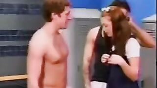 A cute schoolgirl gets fucked by two guys in the locker room