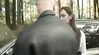 A chick was put on the bonnet of a car and started to get fucked outdoors