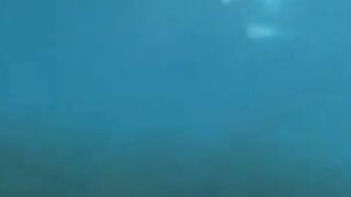 Two aqua sex workers have sex right in the water