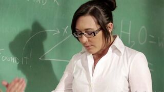 A girl student is being seduced by her hot lesbian teacher on the table