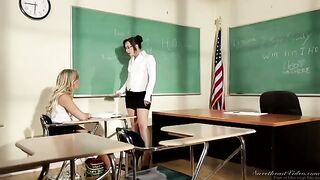 A girl student is being seduced by her hot lesbian teacher on the table