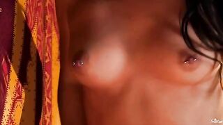 A girl with a nipple piercing plays with her tongue and fingers
