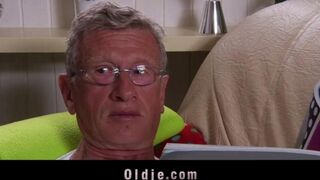 A hot blonde has sex with her older friend on the couch