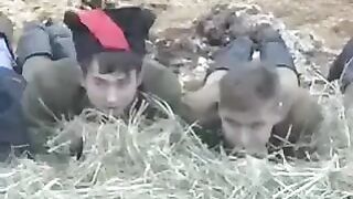 A young girl is having fun with a young man in the barn