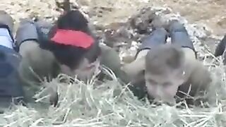 A young girl is having fun with a young man in the barn