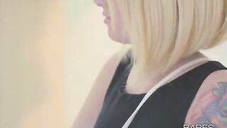 A tattooed woman plays with herself and gets a lot of pleasure