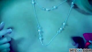 A blonde girl with big boobs masturbates with a dildo in her pussy
