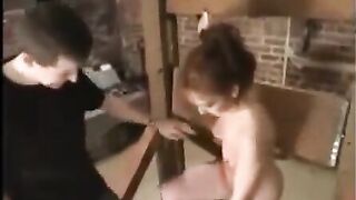 A hot woman is tied up and pleases her dominant sex partner