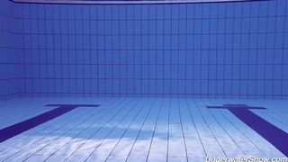 Nude swimming in the pool with a captivating view