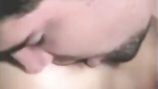 The guy was fucked by a strapon, while another caressed his dick with her hand