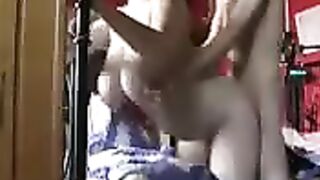 A red-haired beauty with big tits gets fucked at home