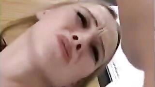 A cute girl has sex with two guys at once and gets her pussy fisted