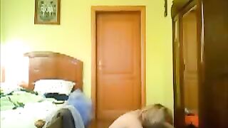 The neighbor peeps at his home and sees a naked girl
