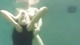 Sex on the ocean floor with a busty brunette can be a lot of fun