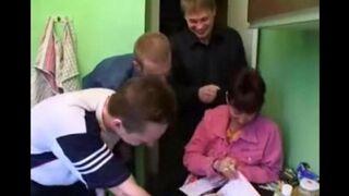 Foursome sex with a Russian mom and three guys in the kitchen
