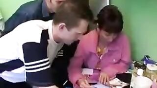 Foursome sex with a Russian mom and three guys in the kitchen