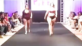 A bunch of fat bitches are running in swimsuits in front of the camera