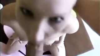 A chick that sucks dick deeply and gives a blowjob with her head down