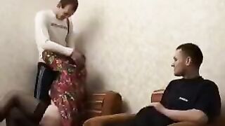 A mature woman fucked by her son and his friend