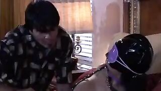 A mistress plays a BDSM game with her man, showcasing her skills