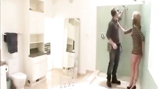 The wife fucked by plumber and her husband in a steamy shower scene