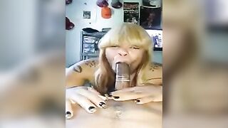 A black beauty took a big dick in her mouth wrapped with condom